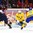 HELSINKI, FINLAND - DECEMBER 28: Sweden's Linus Soderstrom #30 makes a save with Gabriel Carlsson #9 and USA's Nick Schmaltz #9 in front during preliminary round action at the 2016 IIHF World Junior Championship. (Photo by Matt Zambonin/HHOF-IIHF Images)

